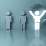 Searching for the right person concept, Stand out from the crowd and different concept , Magnifying glass focusing on the light man standing with arms wide open on green wall background. 3D rendering