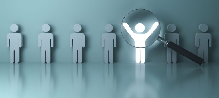 Searching for the right person concept, Stand out from the crowd and different concept , Magnifying glass focusing on the light man standing with arms wide open on green wall background. 3D rendering